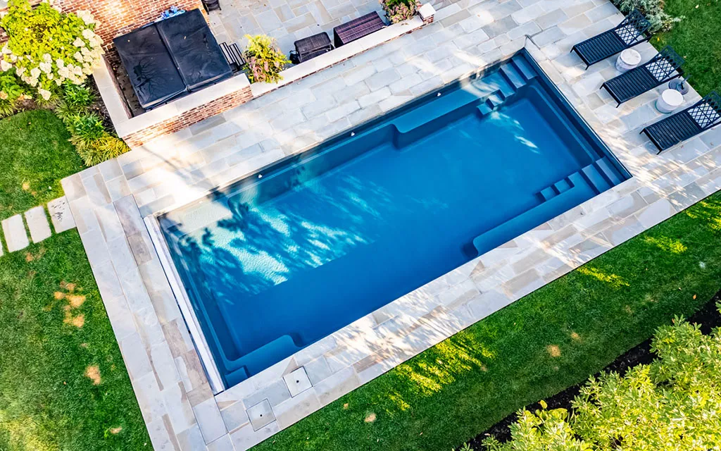 Drone view of a Leisure Pools inground fiberglass pool Expert Pool Builders Who Listen: The Leisure Pools Northern Kentucky Difference